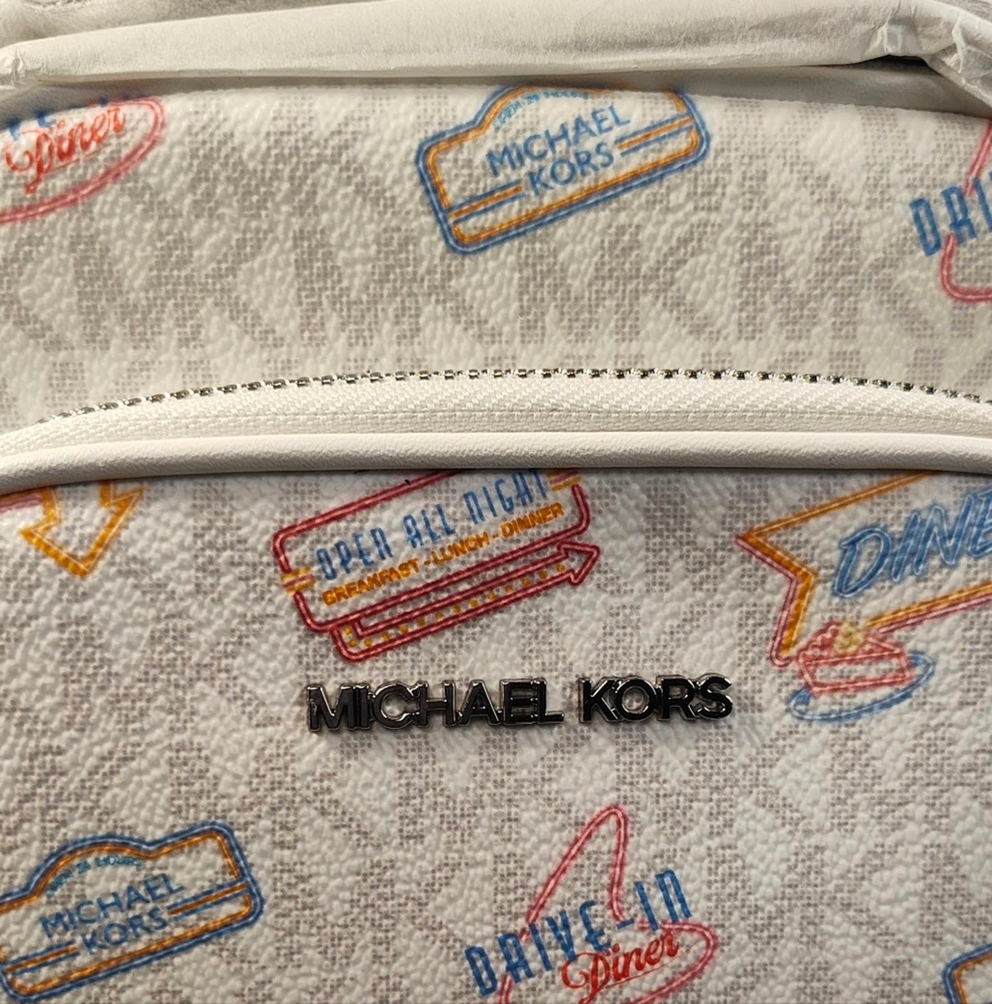 Michael Kors Jet Set Travel Medium Crossbody Bag with a diner-themed signature